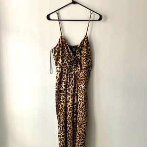 Aqua Leopard cropped jumpsuit. Tie front detail.